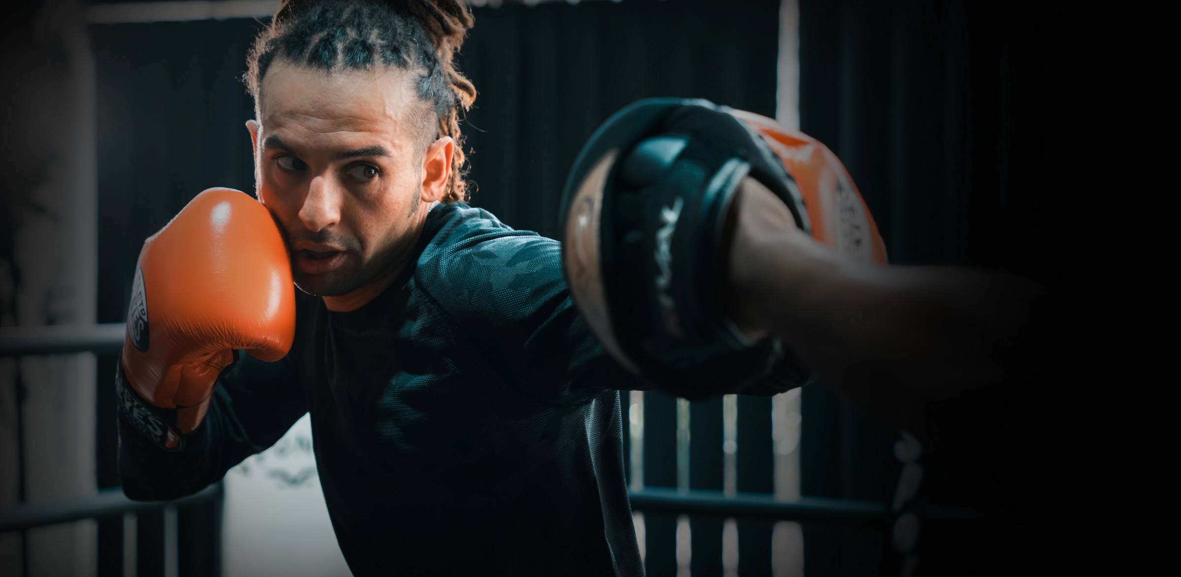 A man punching a boxing bag