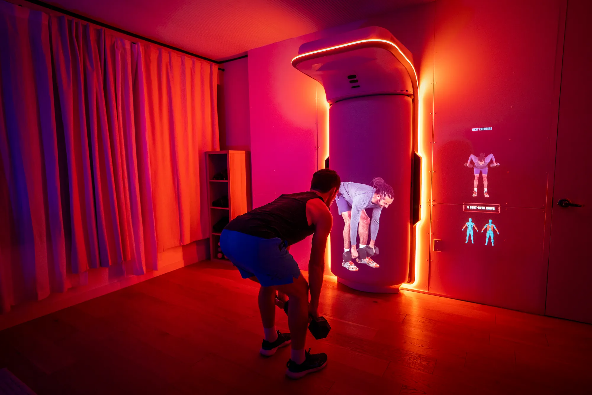 A man working out with Growl's boxing bag, strength and conditioning
